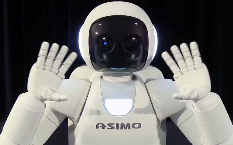 Watch Honda's Asimo Robot Play Soccer